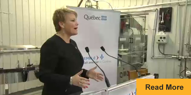 Environment Minister Isabelle Melançon at podium