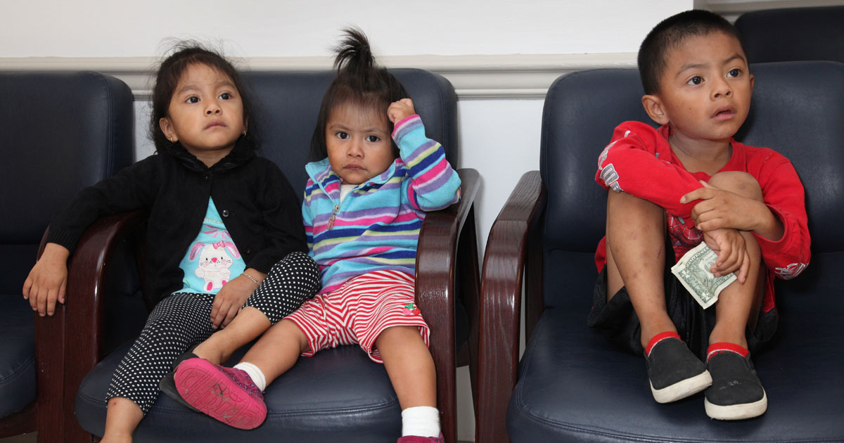 kids sitting in waiting room