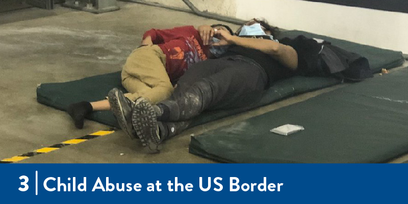 A mother and child lay in a detention center