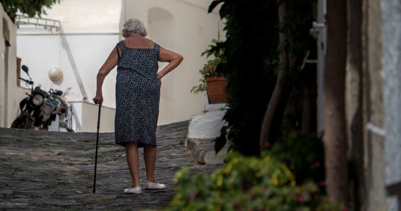 old woman with cane