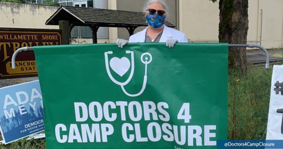 A clinician protests against conditions in migrant detention