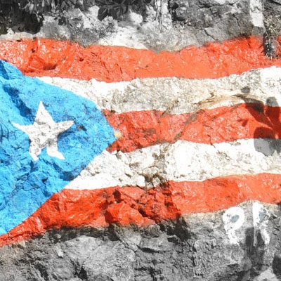 Puerto Rico flag painted on rock
