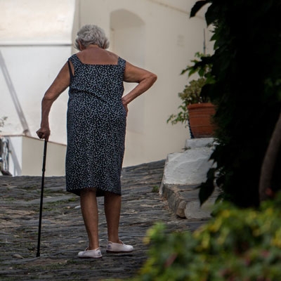 old woman with cane