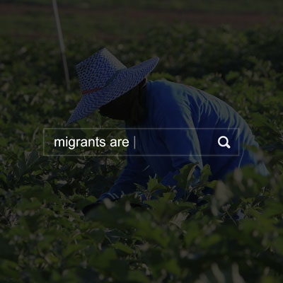 Farm worker in field with search box and text: migrants are